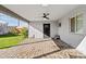Covered patio with brick pavers and access to backyard at 3727 W Orangewood Ave, Phoenix, AZ 85051