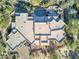 Aerial view of the house, showcasing its unique architecture and backyard pool at 39816 N 106Th Pl, Scottsdale, AZ 85262