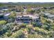 Aerial view showcasing the house's expansive size and desert setting at 39816 N 106Th Pl, Scottsdale, AZ 85262