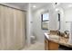 Clean bathroom with shower/tub combo and granite vanity at 39816 N 106Th Pl, Scottsdale, AZ 85262