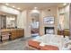 Spa-like bathroom with a large bathtub and double vanities at 39816 N 106Th Pl, Scottsdale, AZ 85262