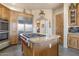 Island kitchen with stainless steel appliances and granite countertops at 39816 N 106Th Pl, Scottsdale, AZ 85262