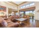 Bright and airy living room with hardwood floors, large windows, and stunning views at 39816 N 106Th Pl, Scottsdale, AZ 85262