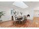 Elegant dining room featuring a fireplace and skylight at 4135 N 33Rd St, Phoenix, AZ 85018