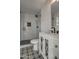 Modern bathroom with white subway tiles and patterned floor at 8349 E Columbus Ave, Scottsdale, AZ 85251