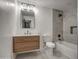 Modern bathroom with floating vanity, bathtub, and updated fixtures at 8349 E Columbus Ave, Scottsdale, AZ 85251