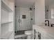 Updated bathroom with white subway tile shower and patterned floor at 8349 E Columbus Ave, Scottsdale, AZ 85251