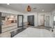 Spacious bedroom with a view into the kitchen and access to other rooms at 8349 E Columbus Ave, Scottsdale, AZ 85251