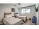 Cozy bedroom featuring two twin beds, perfect for guests at 8349 E Columbus Ave, Scottsdale, AZ 85251