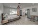 Bedroom with a king bed and access to the backyard at 8349 E Columbus Ave, Scottsdale, AZ 85251