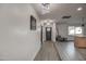 Clean hallway with light wood floors and modern lighting at 8349 E Columbus Ave, Scottsdale, AZ 85251