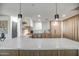 Modern kitchen with light wood cabinets and a large island at 8349 E Columbus Ave, Scottsdale, AZ 85251