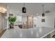 Modern kitchen with an island, stainless steel appliances, and light wood cabinets at 8349 E Columbus Ave, Scottsdale, AZ 85251