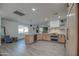 Modern kitchen with light wood cabinets, stainless steel appliances, and an island at 8349 E Columbus Ave, Scottsdale, AZ 85251