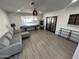 Spacious living room with plenty of natural light and luxury vinyl plank flooring at 8349 E Columbus Ave, Scottsdale, AZ 85251