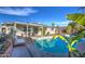 Inviting kidney-shaped pool with patio furniture and covered seating area at 8349 E Columbus Ave, Scottsdale, AZ 85251