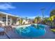 Relaxing kidney-shaped pool in a sunny backyard with patio furniture at 8349 E Columbus Ave, Scottsdale, AZ 85251