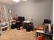 Home office with desk, computer, and shelving at 9333 E University Dr # 196, Mesa, AZ 85207