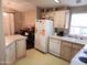 Bright kitchen with ample cabinetry and counter space at 9333 E University Dr # 196, Mesa, AZ 85207