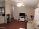 Spacious living room with wood-look flooring at 9333 E University Dr # 196, Mesa, AZ 85207