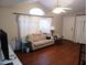 Living room features wood flooring and neutral colors at 9333 E University Dr # 196, Mesa, AZ 85207