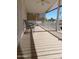 Covered porch with white railing and two chairs at 9333 E University Dr # 196, Mesa, AZ 85207
