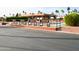 Well maintained tennis courts with comfortable benches and desert landscaping at 9333 E University Dr # 196, Mesa, AZ 85207