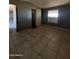 Living room with tiled floors at 966 S Warren Rd, Maricopa, AZ 85139