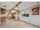 Kitchen with wood cabinets, stainless steel appliances, and an island at 977 S Oxide Dr # 977, Apache Junction, AZ 85119