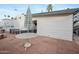 Patio area with table, umbrella and brick flooring at 977 S Oxide Dr # 977, Apache Junction, AZ 85119