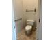 Powder room with toilet and updated fixtures at 11386 E Greythorn Dr, Scottsdale, AZ 85262