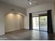 Living room with hardwood floors, recessed lighting and sliding glass doors at 11386 E Greythorn Dr, Scottsdale, AZ 85262