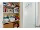 Well-organized pantry with ample shelving for storage at 1403 E Cherry Hills Dr, Chandler, AZ 85249