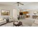 Open concept kitchen with wooden cabinets and breakfast bar at 15433 W Cheery Lynn Rd, Goodyear, AZ 85395