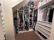 Large walk-in closet with ample shelving and hanging space at 15936 W Canterbury Dr, Surprise, AZ 85379