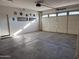 Large garage with ample space for parking and storage at 15936 W Canterbury Dr, Surprise, AZ 85379