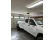 Spacious garage with room for a large truck and additional storage at 15936 W Canterbury Dr, Surprise, AZ 85379