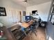 Spacious home office with a large wood desk at 15936 W Canterbury Dr, Surprise, AZ 85379
