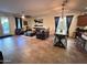Open concept living area with kitchen and dining area at 15936 W Canterbury Dr, Surprise, AZ 85379