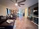 Open concept living room with a view of the kitchen at 15936 W Canterbury Dr, Surprise, AZ 85379