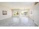 Bright dining room with tile floors and pool view at 17765 W Summit Dr, Goodyear, AZ 85338