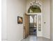 Bright and airy entryway with a modern chandelier at 17765 W Summit Dr, Goodyear, AZ 85338