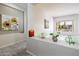 Bright hallway with artwork and decorative accents at 17765 W Summit Dr, Goodyear, AZ 85338