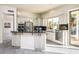 Island kitchen with granite countertops and stainless steel appliances at 17765 W Summit Dr, Goodyear, AZ 85338