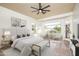 Spacious main bedroom with large windows and backyard access at 17765 W Summit Dr, Goodyear, AZ 85338