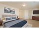 Spacious Primary bedroom with a king-size bed and plenty of natural light at 18526 E Swan Dr, Queen Creek, AZ 85142