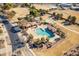 Large community pool and recreational area with playground at 18526 E Swan Dr, Queen Creek, AZ 85142