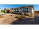 Landscaped backyard with gravel and plants at 21778 N 259Th Ln, Buckeye, AZ 85396