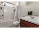 Clean bathroom with bathtub, shower, and vanity with sink at 21778 N 259Th Ln, Buckeye, AZ 85396