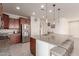 Spacious kitchen featuring stainless steel appliances and granite countertops at 21778 N 259Th Ln, Buckeye, AZ 85396